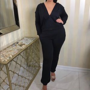 Black sweat suit jacket and pants